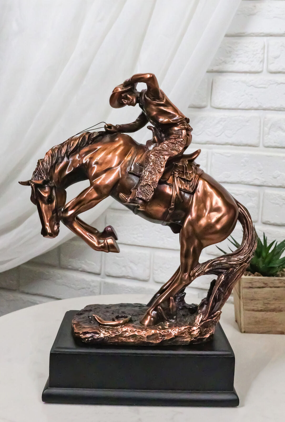 Rustic Western Rodeo Cowboy on a Rearing Horse Bronzed Resin Statue