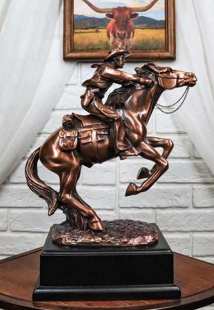 Rustic Western Wild Cowboy Bracing on a Galloping Horse Bronzed Resin Statue