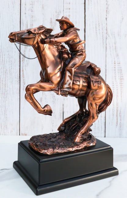 Rustic Western Wild Cowboy Bracing on a Galloping Horse Bronzed Resin Statue